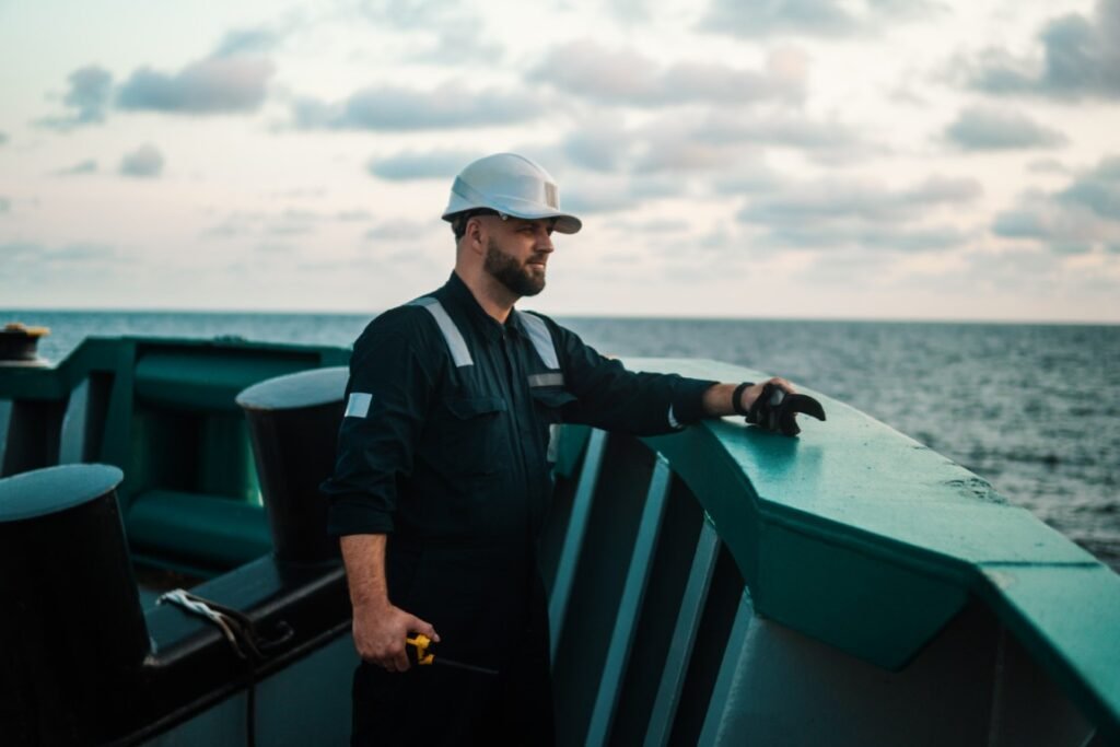 A marine deck officer working offshore